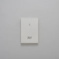 2027 Mini Planner A6 by Take a Note — compact white cover with gold-foil 2027 and logo, for journaling & planning