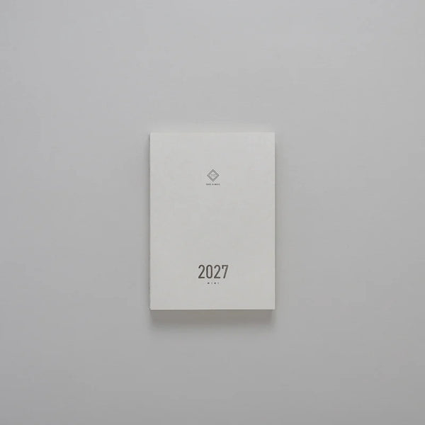 2027 Mini Planner A6 by Take a Note — compact white cover with gold-foil 2027 and logo, for journaling & planning