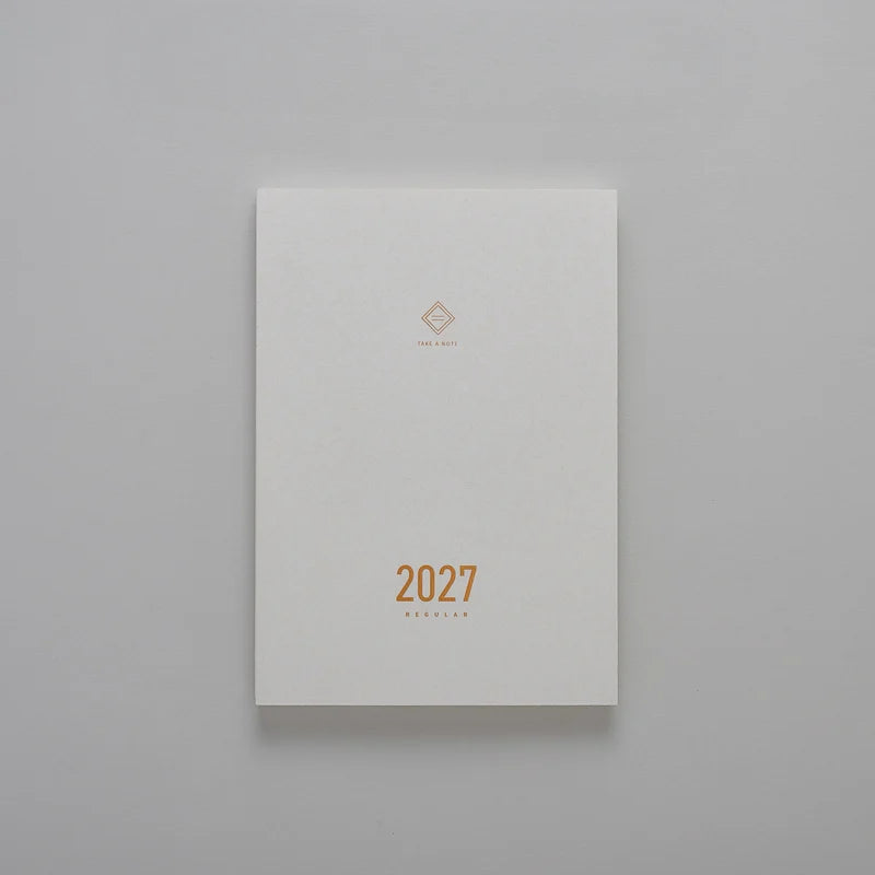 2027 Regular Planner A5 by Take a Note — minimalist white cover with gold-foil 2027, for journaling & planning