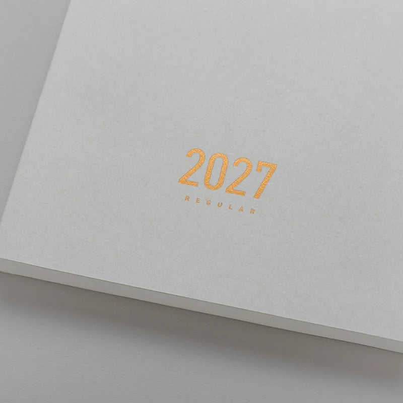 2027 Regular Planner A5 by Take a Note — cover detail with gold-foil 2027 and Regular, for planning