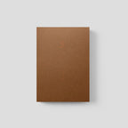 Brown notebook on a light gray background