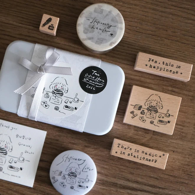 My Beautiful Mess Rubber Stamp collection with stationery items on a wooden surface