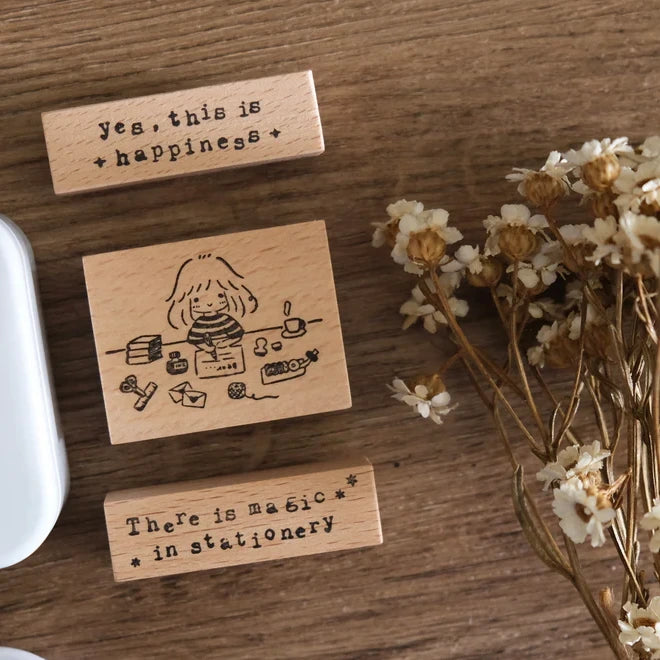 Three My Beautiful Mess wooden stamps with engraved text styled with flowers on wood