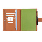 Elite Planner Cover A5 by Moterm — brown pebbled-leather cover open with notebook and pen, for journaling