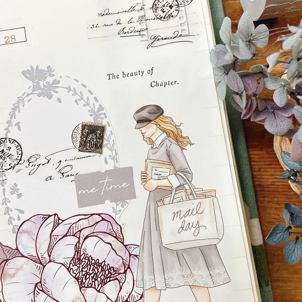 Illustration of a woman with a 'mail day' bag surrounded by flowers and text on a wooden surface.