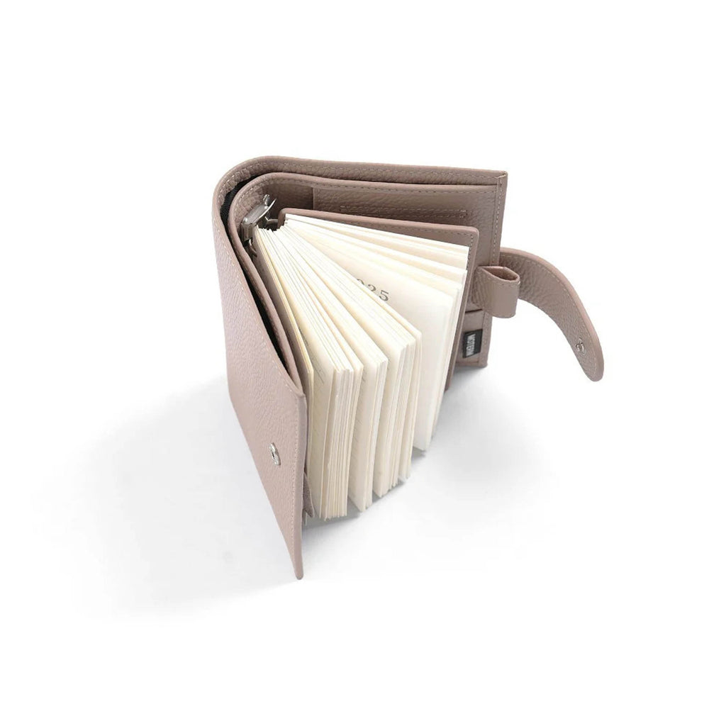 Regular 2.0 Rings Planner Pocket by Moterm — pebbled-leather cover open with fanned pages, for journaling