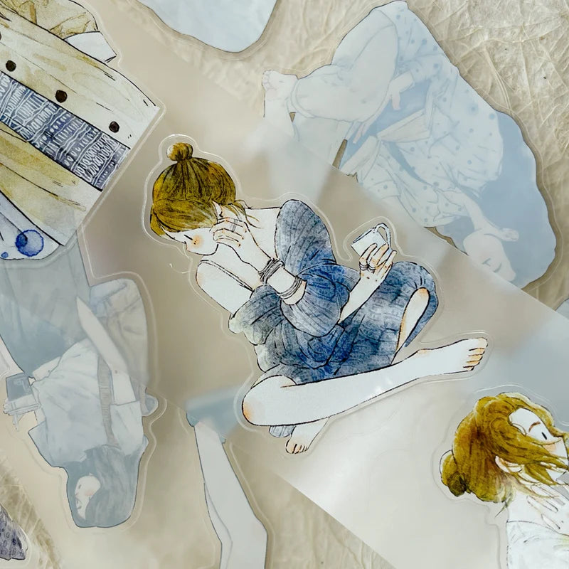 A Cup 38 PET Tape girl reading on the floor among abstract shapes and patterns, detail view