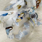 Decorative wall art with illustrated characters on a textured surface
