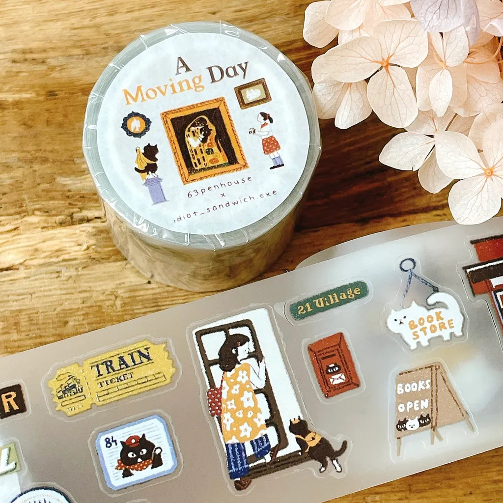 A Moving Day Crystal PET Tape by 63penhouse illustrated stickers on a wooden surface with flowers