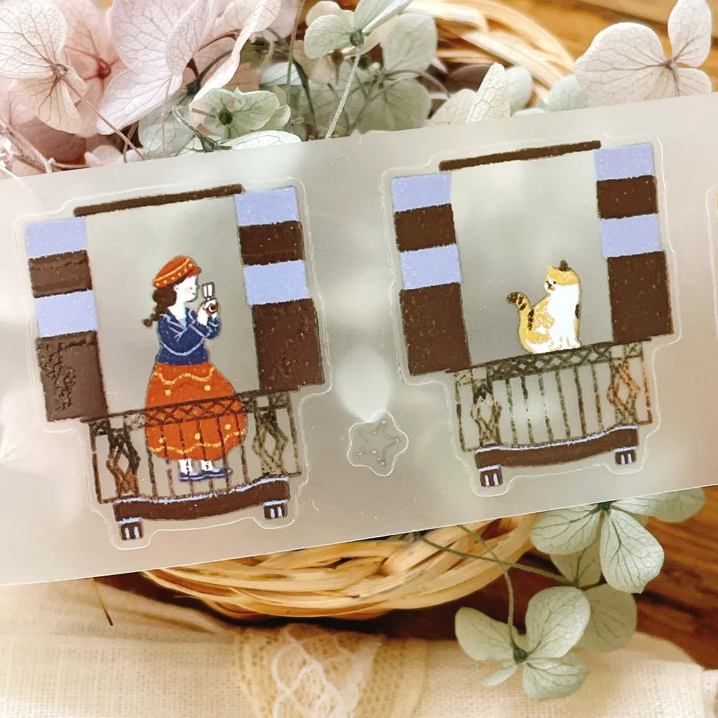 A Moving Day stickers of a person and cat on a balcony, styled on texture with flowers