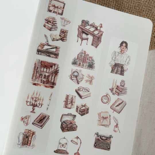 Sheet of vintage-style Academia PET Tape illustrations styled on a notebook, overhead detail view
