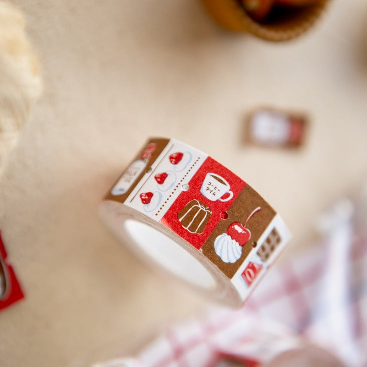 Decorative tape with red and white design on a blurred background