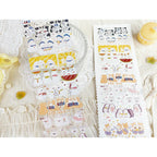 Set of cartoon character stickers on a decorative surface with flowers.