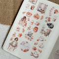 Sheet of autumn-themed stickers with illustrations on a textured surface