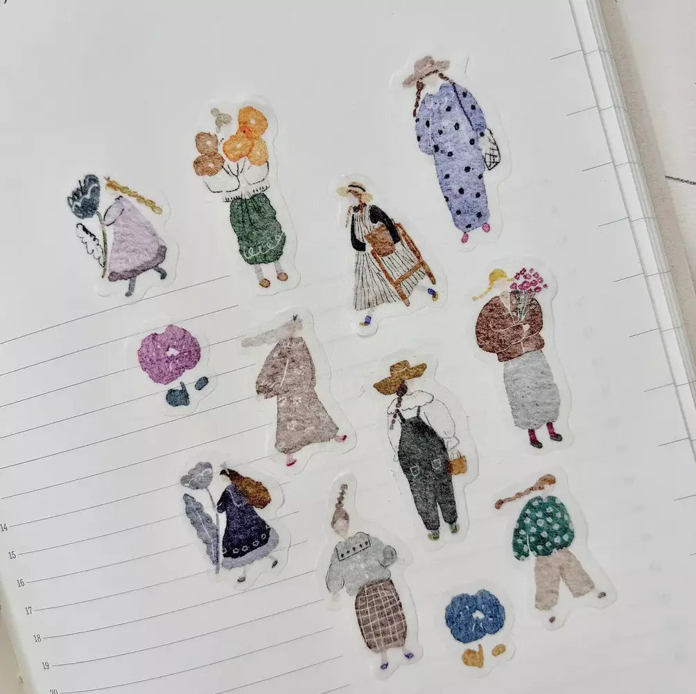 Illustrated figures in various outfits on lined paper
