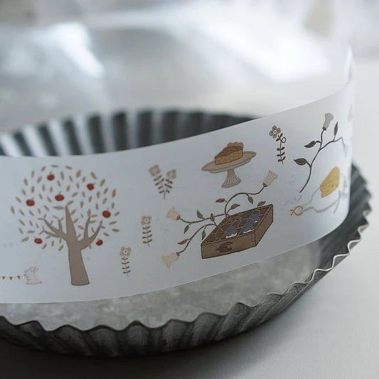 At The Farm PET Tape ribbon of farm illustrations styled across a metal cake pan