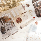 Autumn-themed decor items including pumpkins, leaves, and a cozy scene with a blanket and pillows.