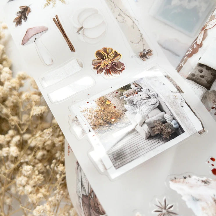 Decorative box styled with Autumn's Pause PET Tape, dried flowers and a small plant on white