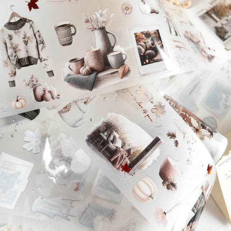 Collage of photos and stationery items on a light surface