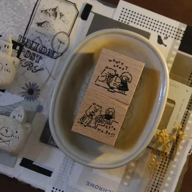 Travel Together Again wooden stamp displayed in a small dish on a patterned surface