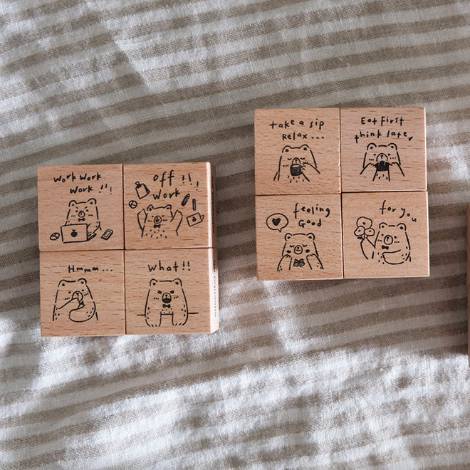 Full set of Beary Ordinary Days 01 wooden stamps with bear illustrations on striped fabric