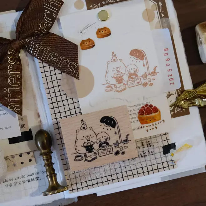 Bear and Girl Blissful Days Rubber Stamp styled with a ribbon and wax seal on a white surface