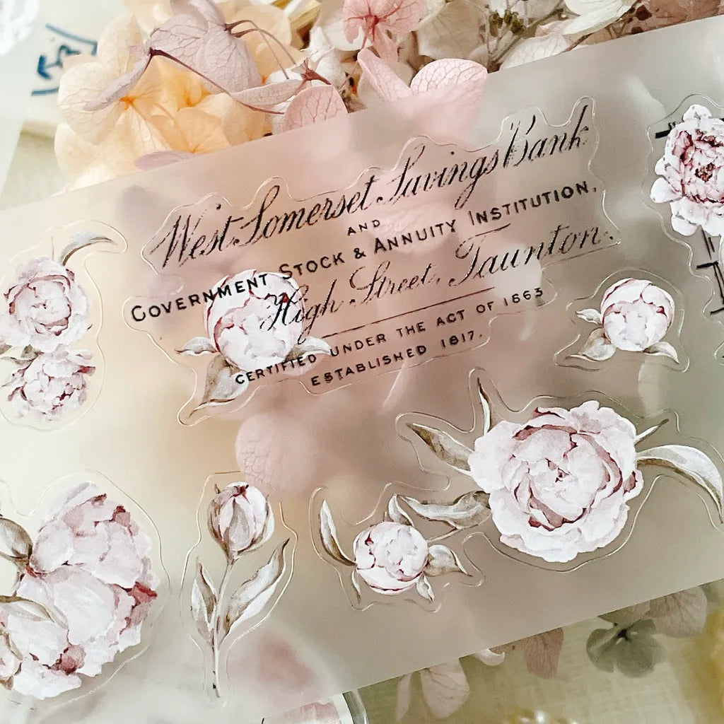Card decorated with Blooming Archive PET Tape floral designs and text on a light backdrop
