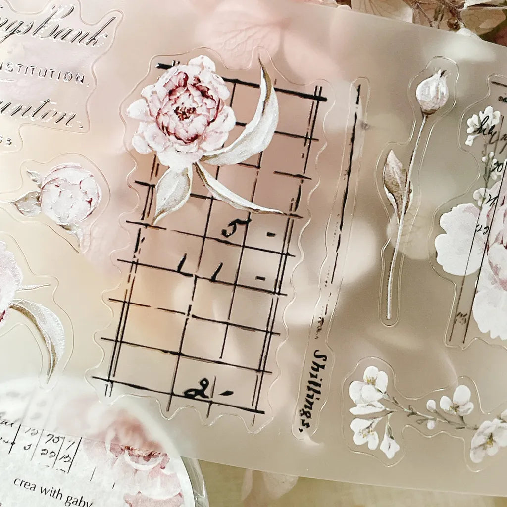 Blooming Archive PET Tape styled with a clear acrylic stamp of florals and musical notes
