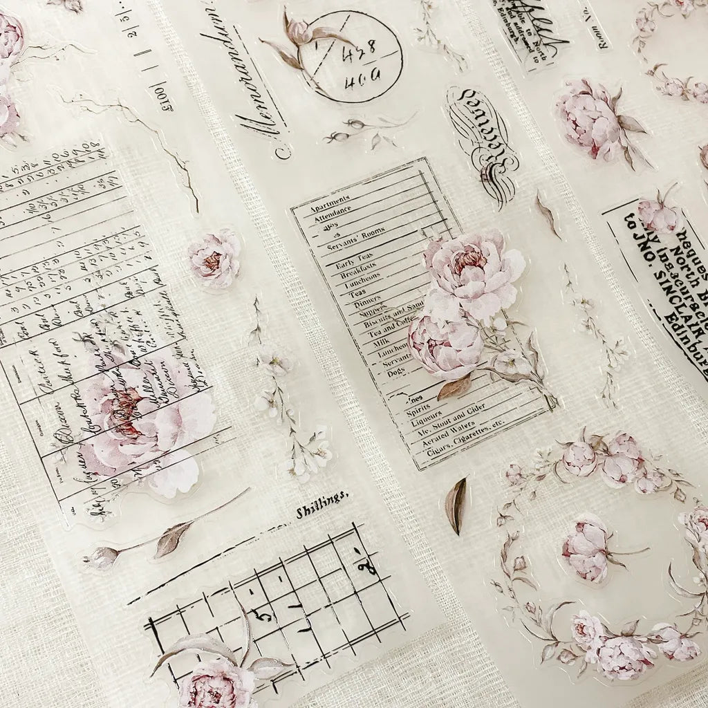 Blooming Archive PET Tape floral and script designs on paper on a textured background