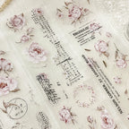 Decorative paper with floral designs and text on a light background