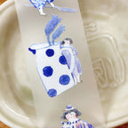 Minimalist PET tape with hand-painted blue illustration of girl sitting beside patterned clock and floral frame