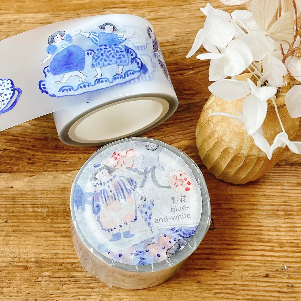 Full set of Blue And White PET Tape character strips displayed on a wooden surface
