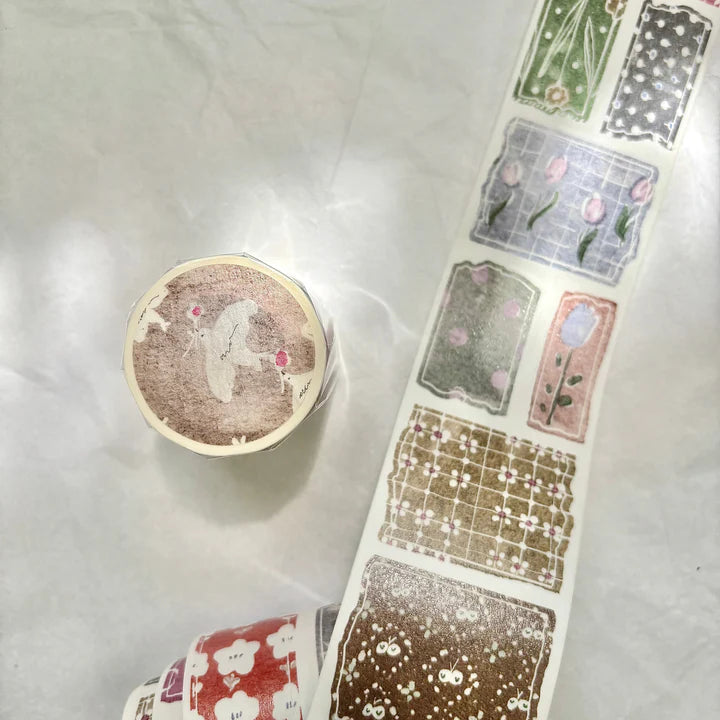 Candy Papers Washi Tape floral and geometric candy-inspired designs on a white surface, close-up