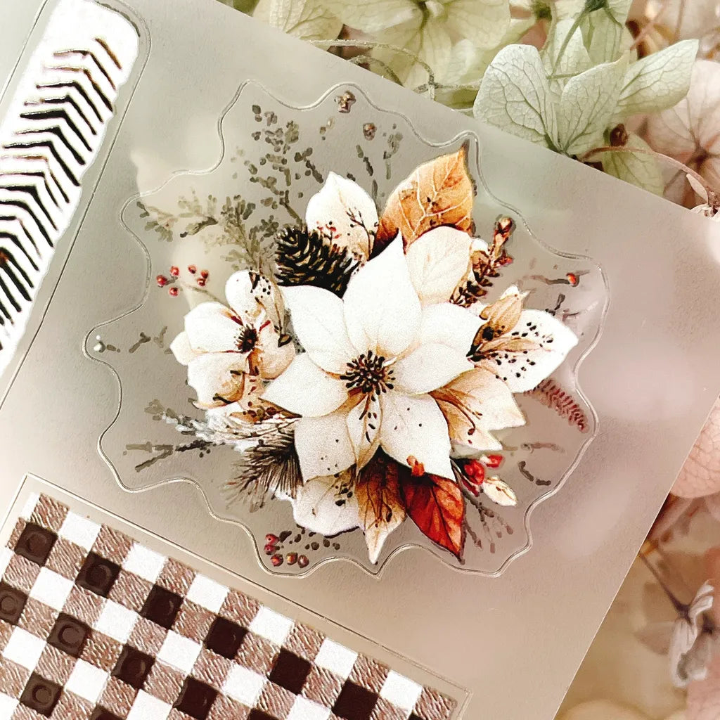 Christmas Wishes PET Tape clear floral design displayed on a checkered surface, detail view