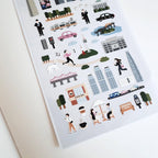 Sheet of illustrated cityscape stickers with people, buildings, and vehicles on a white background.