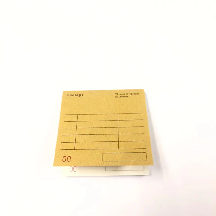 Stack of yellow Classiky Receipt Memo Pads displayed on a clean white background