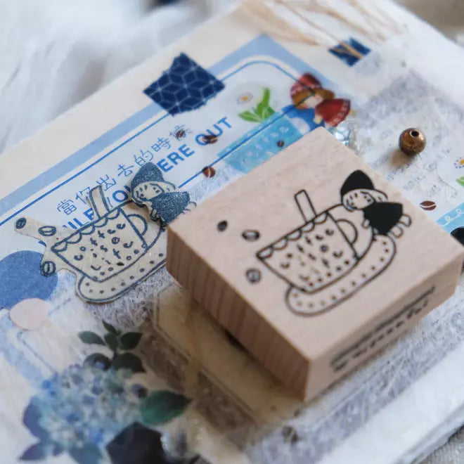 Simple Happiness Coffee is Life stamp with a character holding a cup on a decorative backdrop