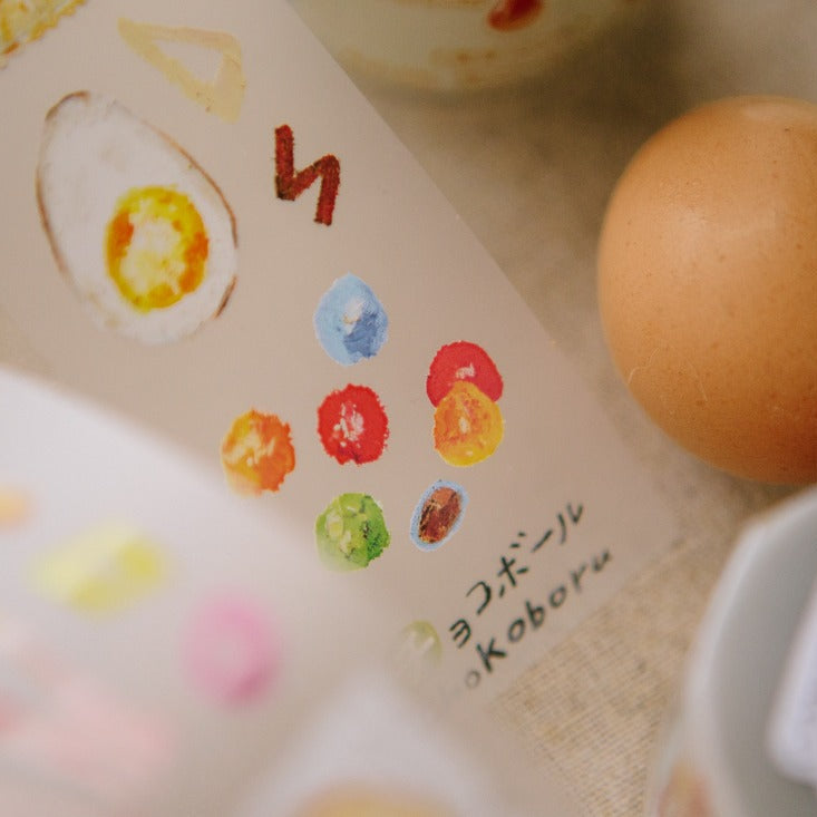 Convenience Store PET Tape by OURS Studio styled with eggs and colorful props in a playful scene