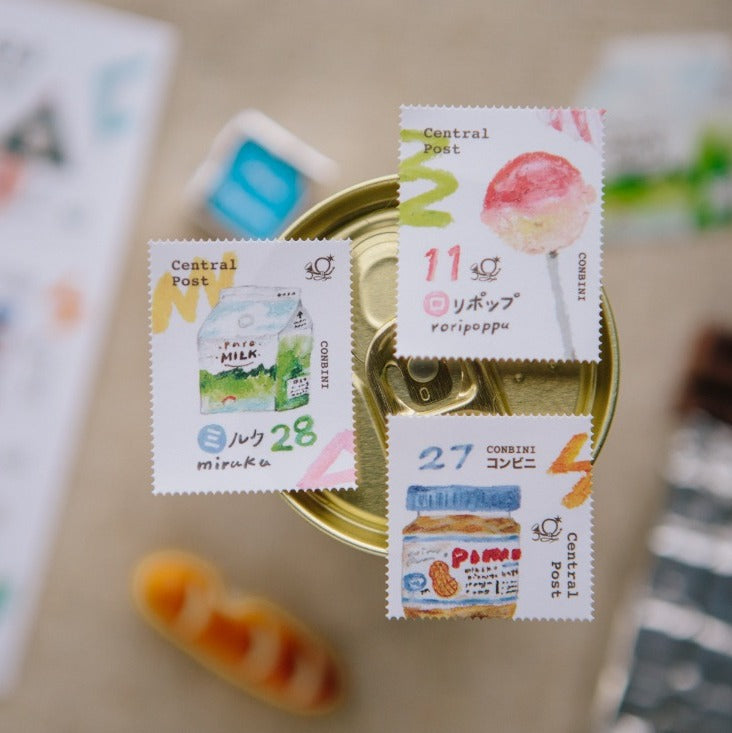 Collection of small food packages with labels on a blurred background