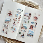 Two sheets of temporary tattoos featuring beach-themed designs on a woven surface.