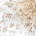 Floral bedding set with dried flowers on a light background