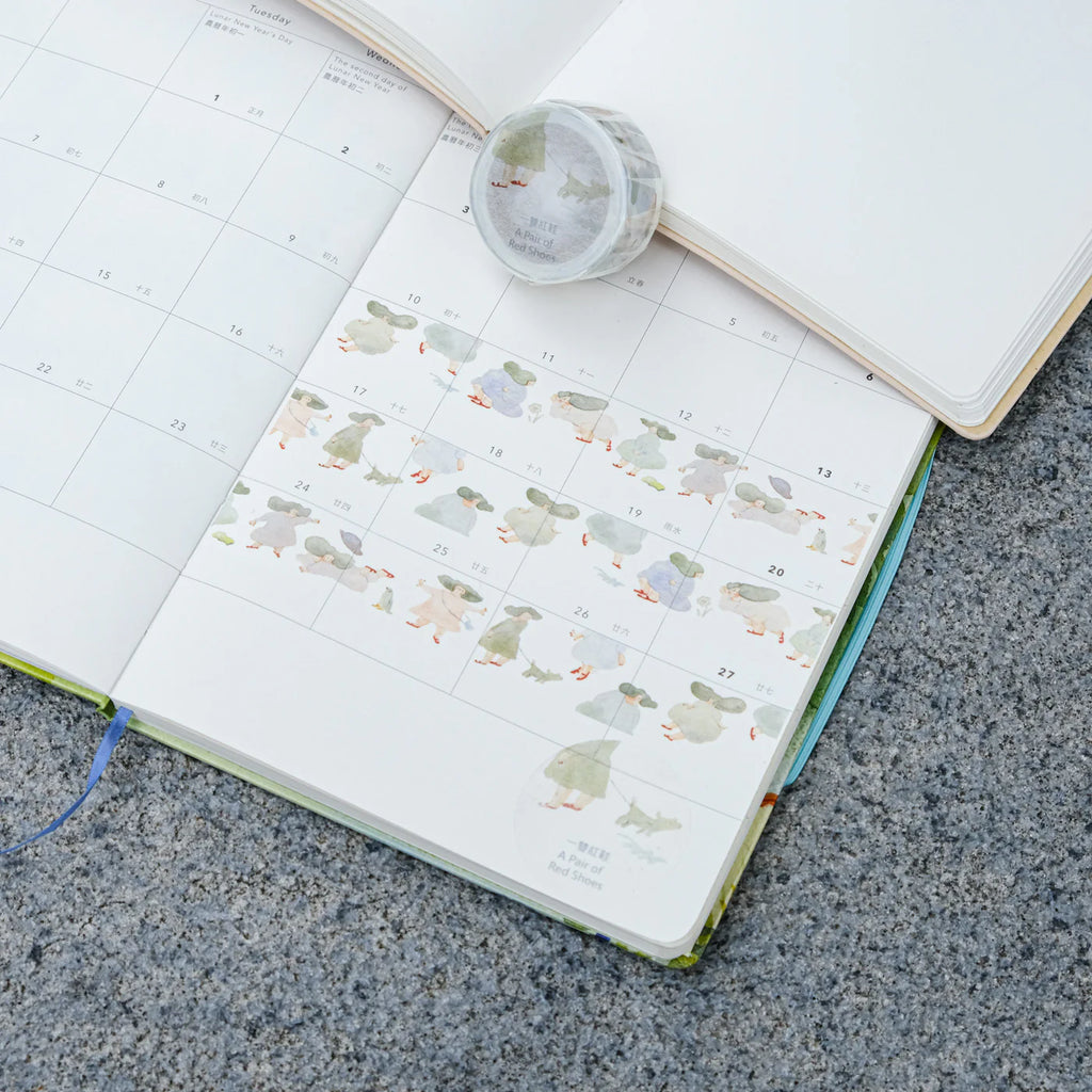 A Pair of Red Shoes Washi Tape by Dodolulu — cartoon-duck washi tape in an open planner, for journaling