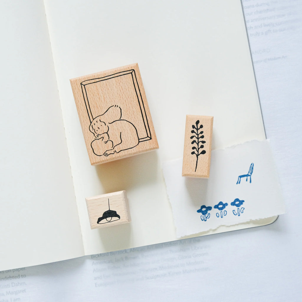 By The Window Rubber Stamp by Dodolulu — rubber stamps on a notebook page, for journaling
