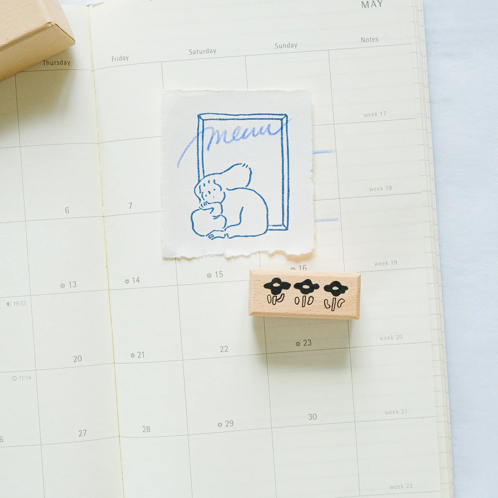 By The Window Rubber Stamp by Dodolulu — bear-holding-menu stamped design in a calendar, for journaling