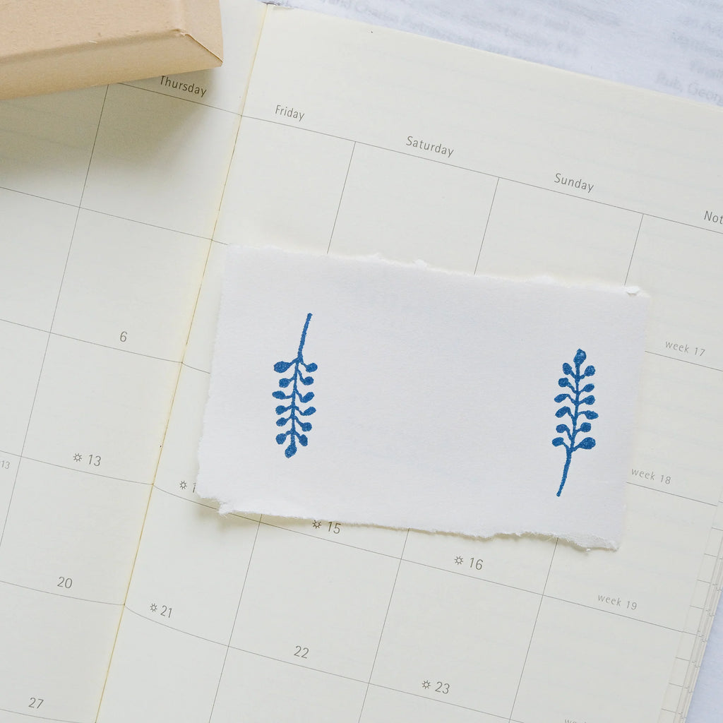By The Window Rubber Stamp by Dodolulu — blue floral stamped design in a calendar, for journaling