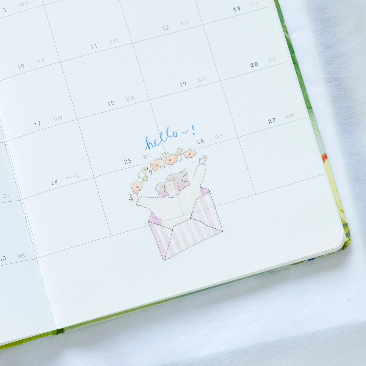 Beyond Imagination Sticker Set by Dodolulu — girl-in-an-envelope 'hello!' sticker in a calendar, for journaling