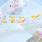 Indulgence PET Tape by Dodolulu — character PET tape on a notebook page, for journaling