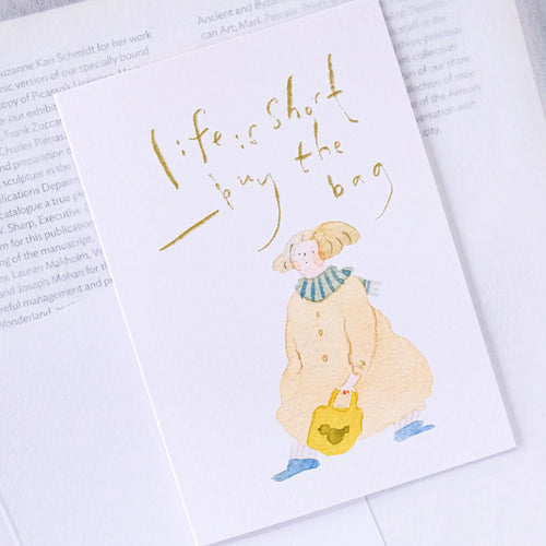 Buy The Bag Greeting Card by Dodolulu — figure-with-bag quote card shown on white, for gifting