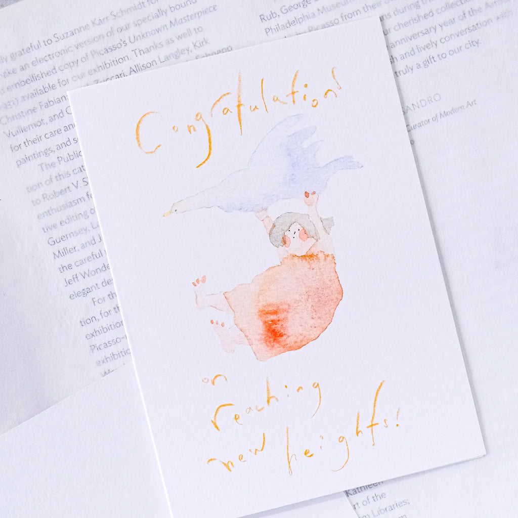 Reaching New Heights Greeting Card by Dodolulu — watercolour baby illustration shown on white, for gifting