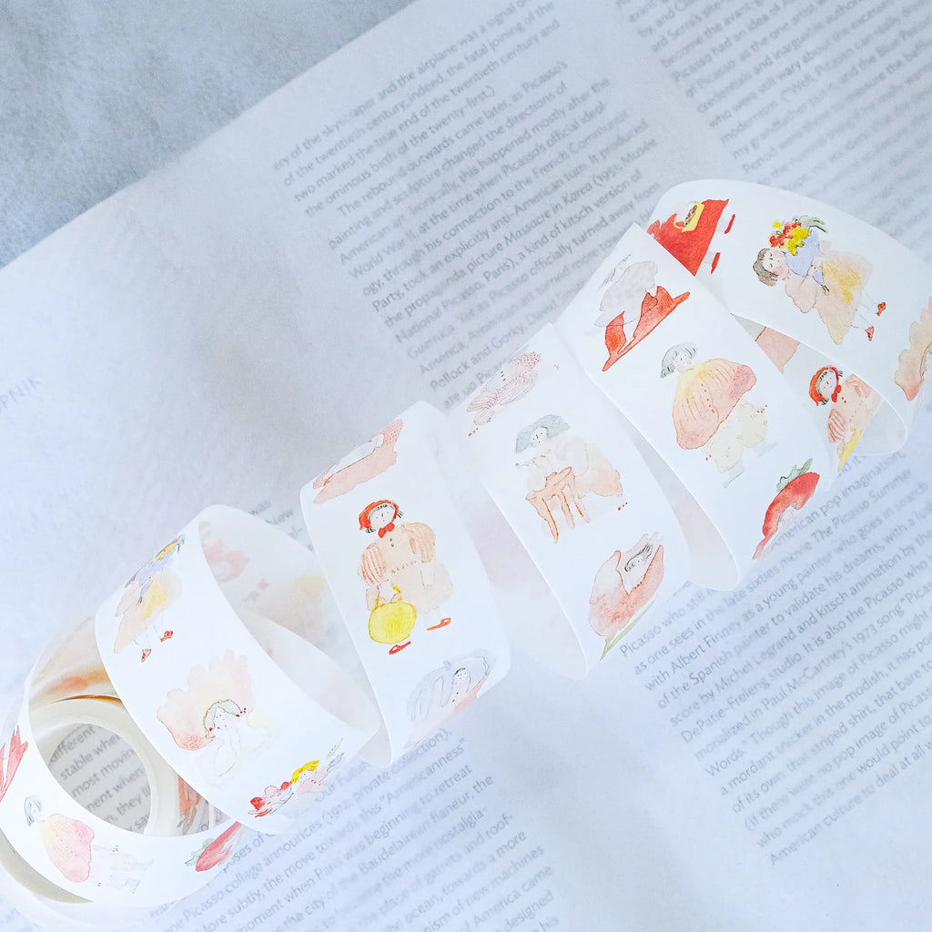 Seasons Quartet Vol.1 Washi Tape by Dodolulu — character washi tape roll on an open book, for journaling